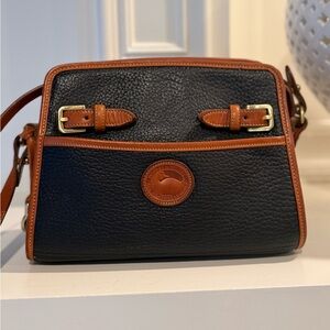 Vintage Dooney and Bourke Zip Top Shoulder Bag
Black w/ British Tan Trim